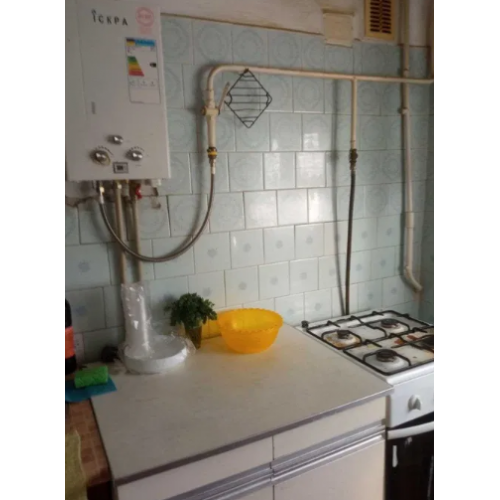 Продам в абсолютному центрі Чугуєва в цегляному будинку